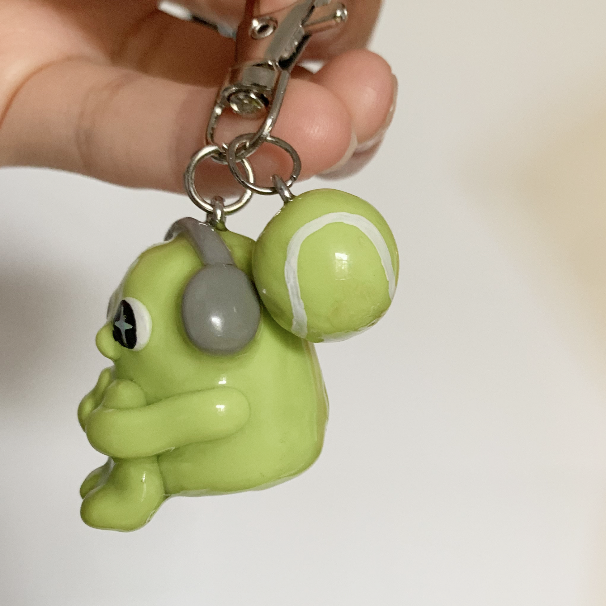 Tennis Ball Anxious Guy Keychain Indigopearl